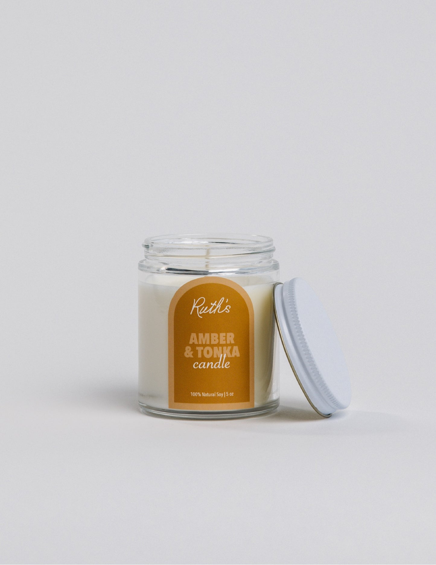 Amber & Tonka Candle Jar Open