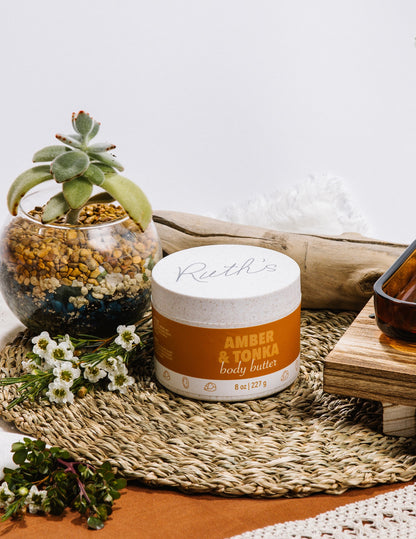 Lifestyle photo of an Amber & Tonka Body Butter